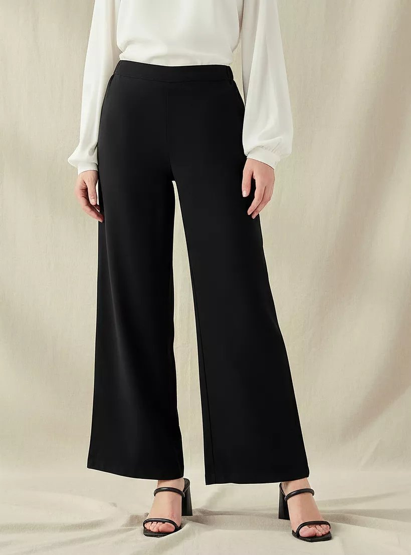 بنطلون واسع الساقين بقصة عادية وخصر متوسط الارتفاع